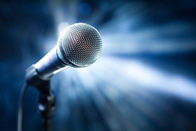 bigstock-microphone-on-stage-26918468